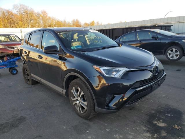 TOYOTA RAV4 LE 2018 with VIN 2T3BFREV5JW722870 - Photo from auction
