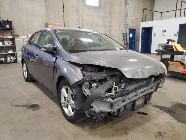 FORD FOCUS SE 2014 with VIN 1FADP3F20EL368102 - Photo from auction