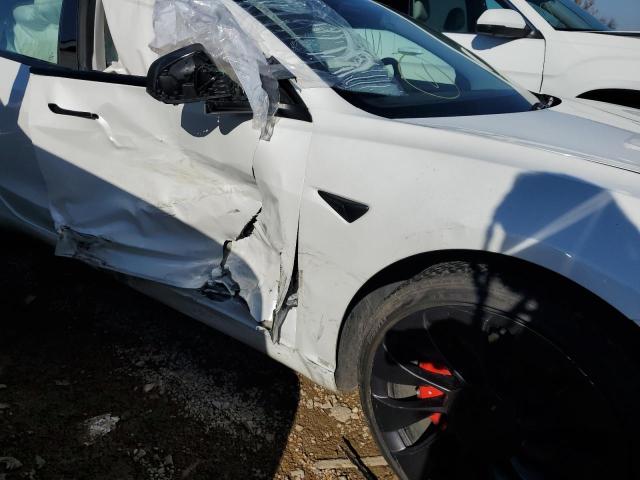 Photo 9 from auction – 2021 TESLA MODEL 3 with VIN 5YJ3E1ECXMF056154