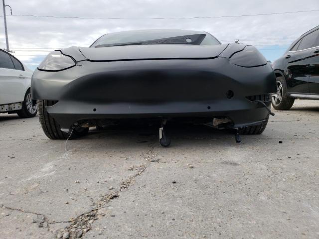 Photo 9 from auction – 2021 TESLA MODEL 3 with VIN 5YJ3E1EA6MF871160