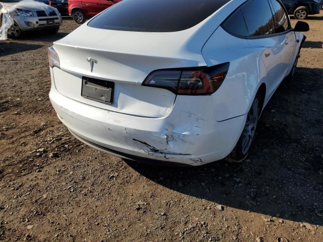 Photo 9 from auction – 2021 TESLA MODEL 3 with VIN 5YJ3E1EA4MF921649