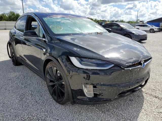 TESLA MODEL X 2017 with VIN 5YJXCAE27HF076981 - Photo from auction