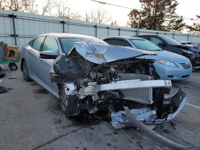 HONDA CIVIC EX 2017 with VIN 19XFC2F75HE014402 - Photo from auction