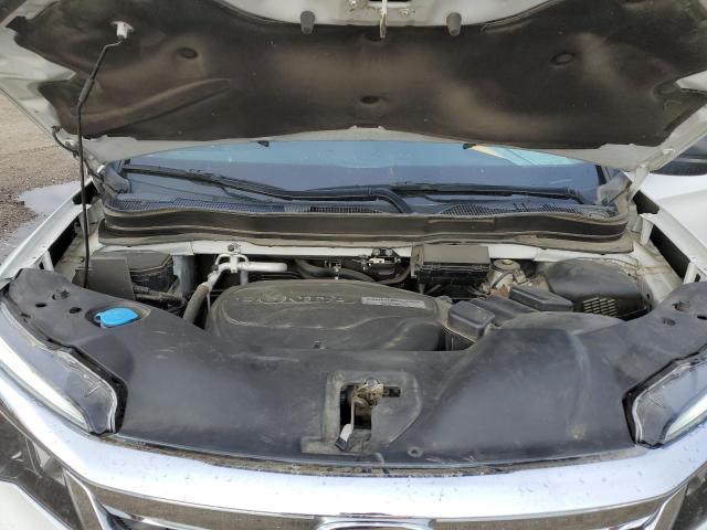 Photo 7 from auction – 2020 HONDA PILOT LX with VIN 5FNYF5H17LB019954