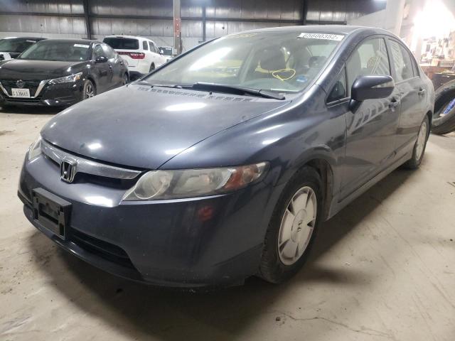 Photo 2 from auction – 2006 HONDA CIVIC HYBR with VIN JHMFA36246S013489