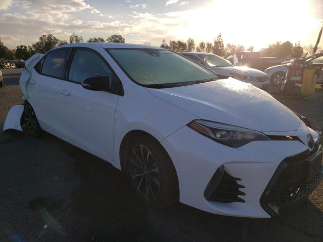 TOYOTA COROLLA 2017 z numerem VIN 5YFBURHE3HP597289 - Zdjęcie z aukcji