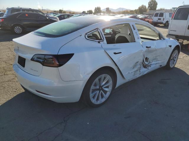 Photo 4 from auction – 2022 TESLA MODEL 3 with VIN 5YJ3E1EB8NF352329