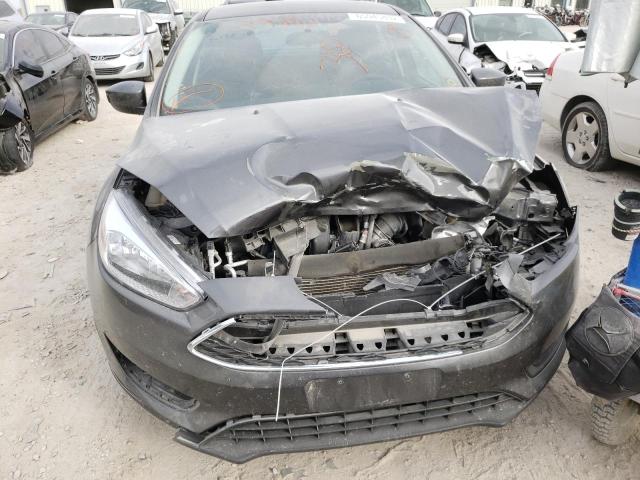 Photo 9 from auction – 2018 FORD FOCUS SE with VIN 1FADP3F22JL228031