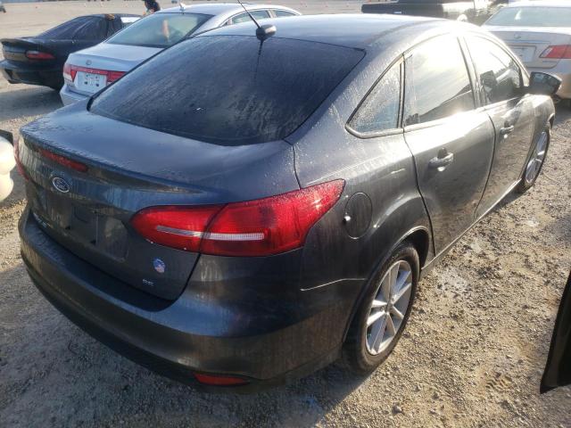 Photo 4 from auction – 2018 FORD FOCUS SE with VIN 1FADP3F25JL308634