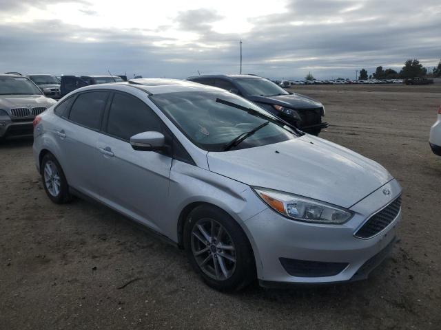 FORD FOCUS SE 2016 with VIN 1FADP3F28GL283463 - Photo from auction