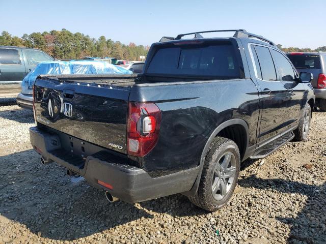 Photo 4 from auction – 2022 HONDA RIDGELINE with VIN 5FPYK3F51NB001059