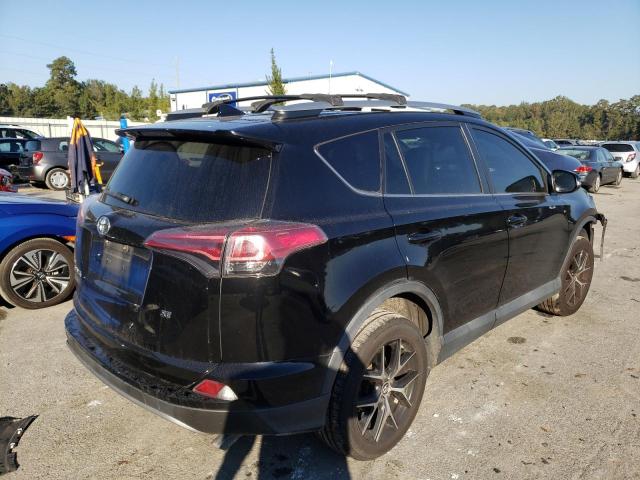 Photo 4 from auction – 2018 TOYOTA RAV4 SE with VIN 2T3NFREV0JW432033