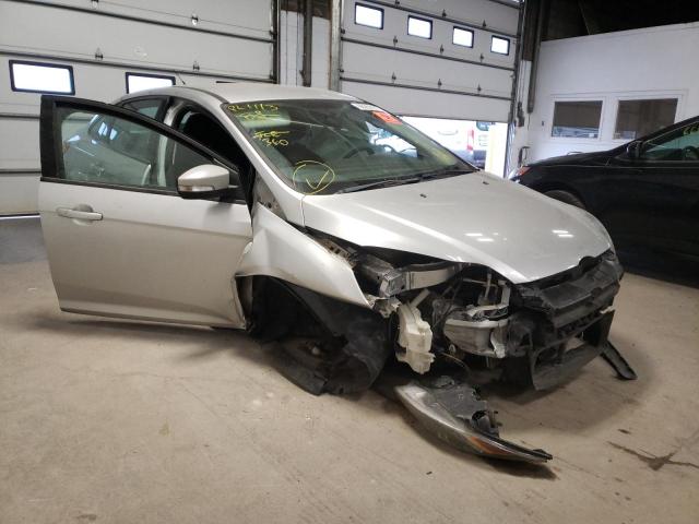 FORD FOCUS SE 2014 with VIN 1FADP3F20EL258229 - Photo from auction