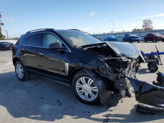 CADILLAC SRX 2015 with VIN 3GYFNAE31FS628729 - Photo from auction