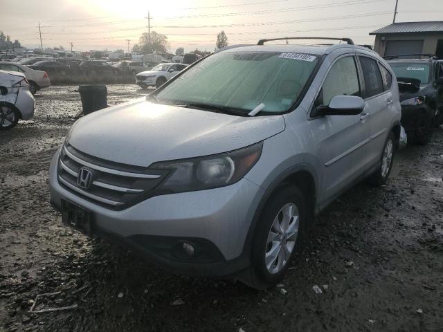 Photo 2 from auction – 2012 HONDA CRV with VIN JHLRM4H77CC020675