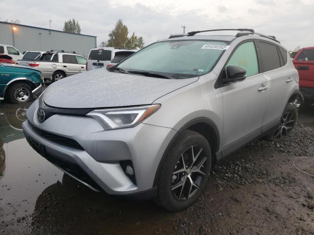 Photo 2 from auction – 2017 TOYOTA RAV4 SE with VIN 2T3JFREV3HW675702