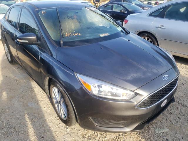 FORD FOCUS SE 2018 with VIN 1FADP3F25JL308634 - Photo from auction