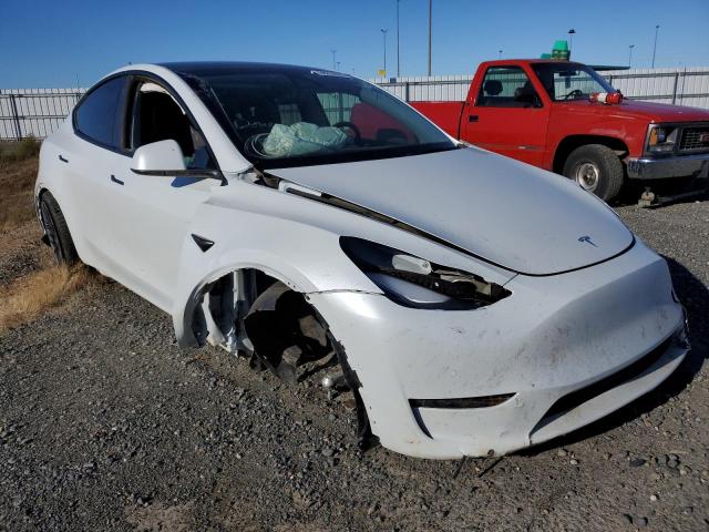 TESLA MODEL Y 2021 with VIN 5YJYGDEFXMF258309 - Photo from auction