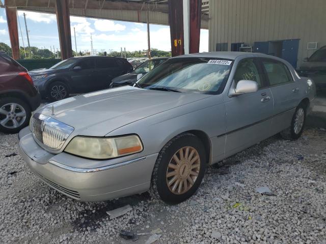 Photo 2 from auction – 2004 LINCOLN TOWN CAR E with VIN 1LNHM81W64Y685231