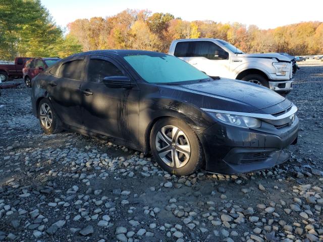 HONDA CIVIC LX 2018 with VIN 2HGFC2F58JH574862 - Photo from auction