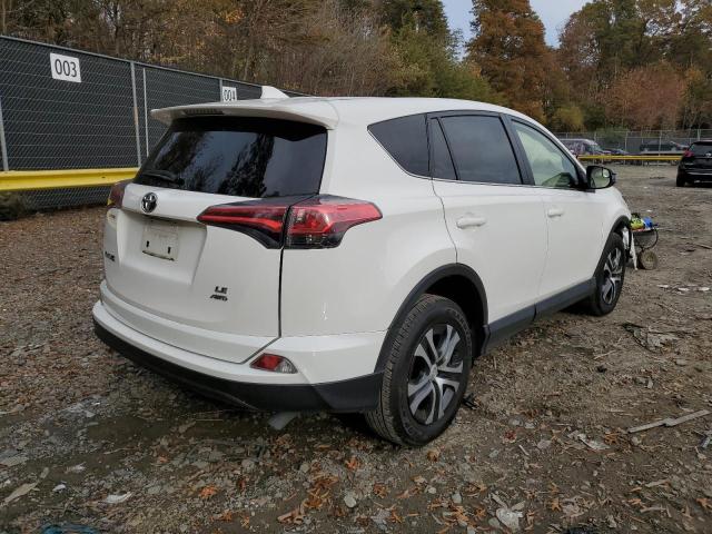 Photo 4 from auction – 2018 TOYOTA RAV4 LE with VIN JTMBFREV7JJ727017