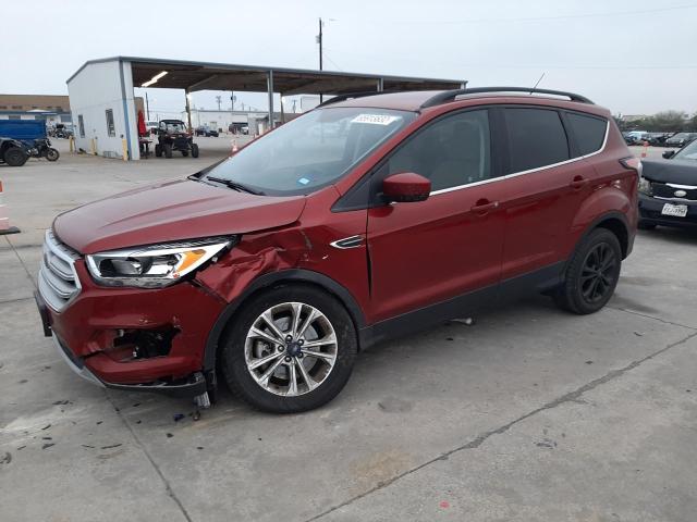FORD ESCAPE SE 2018 with VIN 1FMCU9G96JUC64890 - Photo from auction