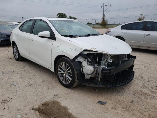 TOYOTA COROLLA L 2015 with VIN 2T1BURHE5FC299467 - Photo from auction