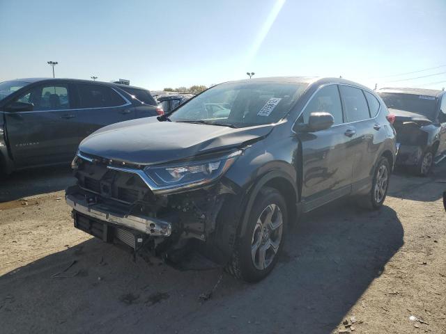 Photo 2 from auction – 2018 HONDA CR-V with VIN 7FARW2H81JE064101