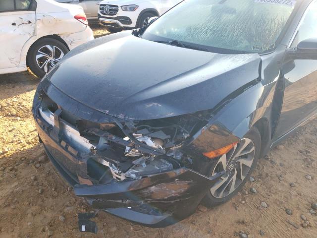 Photo 9 from auction – 2018 HONDA CIVIC EX with VIN 19XFC2F77JE023995