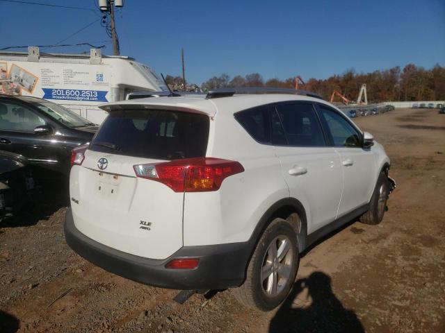 Photo 4 from auction – 2014 TOYOTA RAV4 XLE with VIN JTMRFREVXEJ011877