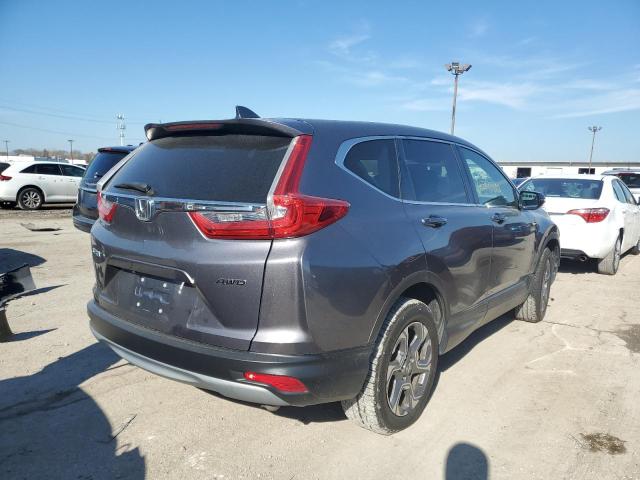 Photo 4 from auction – 2018 HONDA CR-V with VIN 7FARW2H81JE064101