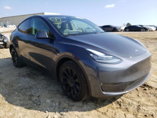 TESLA MODEL Y 2022 with VIN 7SAYGDEE1NF443747 - Photo from auction