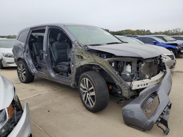 HONDA PILOT TOUR 2017 with VIN 5FNYF5H92HB041373 - Photo from auction