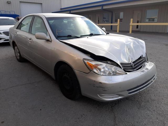 TOYOTA CAMRY LE 2004 with VIN 4T1BE32K64U878178 - Photo from auction