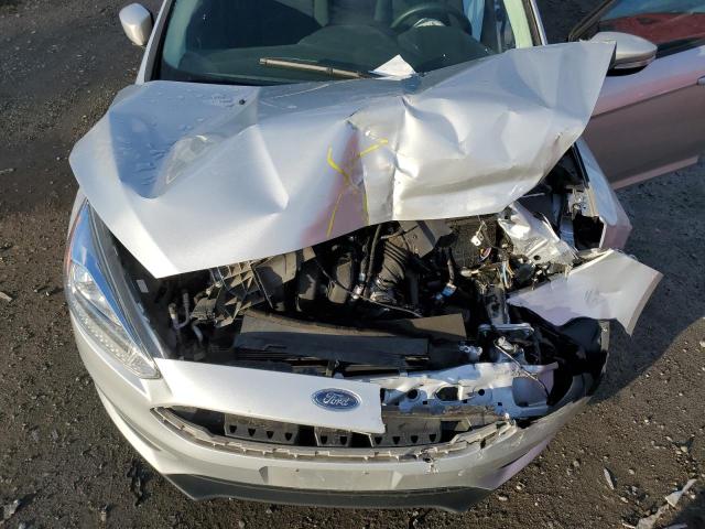 Foto 7 de la subasta – 2016 FORD FOCUS SE con VIN 1FADP3K21GL255008