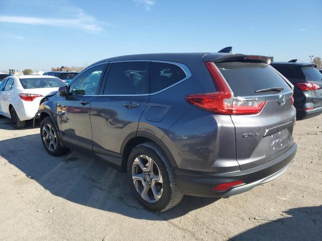 Photo 3 from auction – 2018 HONDA CR-V with VIN 7FARW2H81JE064101