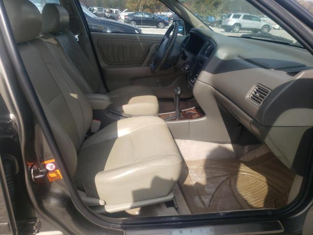 Photo 5 from auction – 2002 INFINITI G20 with VIN JNKCP11A52T512987