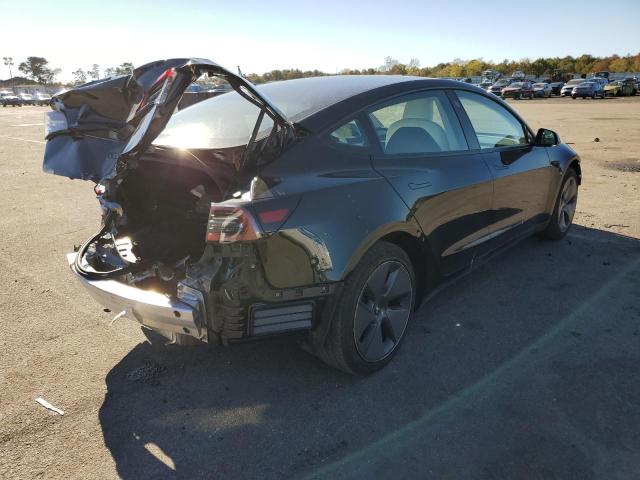 Photo 4 from auction – 2021 TESLA MODEL 3 with VIN 5YJ3E1EA3MF989506