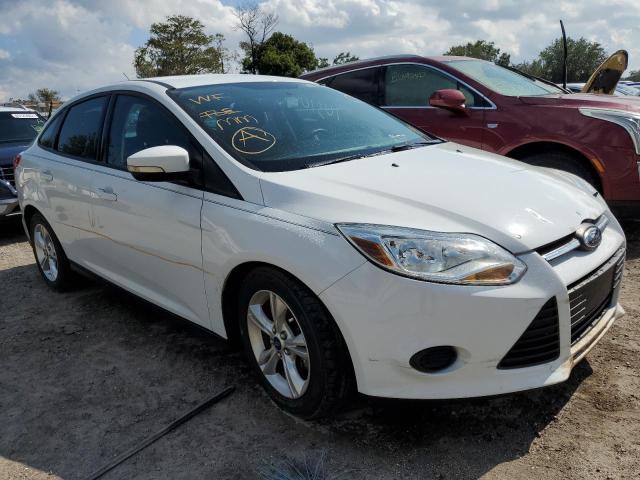 FORD FOCUS SE 2014 with VIN 1FADP3F24EL268858 - Photo from auction