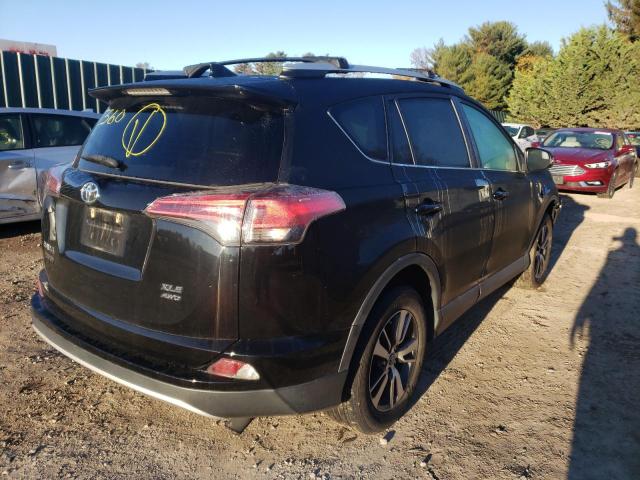 Photo 4 from auction – 2016 TOYOTA RAV4 XLE with VIN 2T3RFREV3GW519144