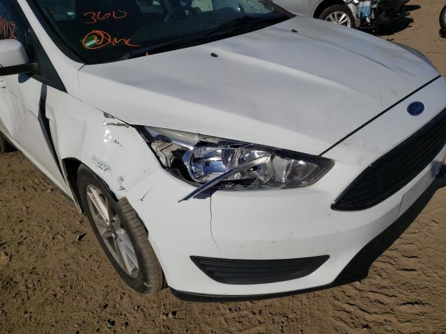 Photo 9 from auction – 2015 FORD FOCUS SE with VIN 1FADP3K28FL201459
