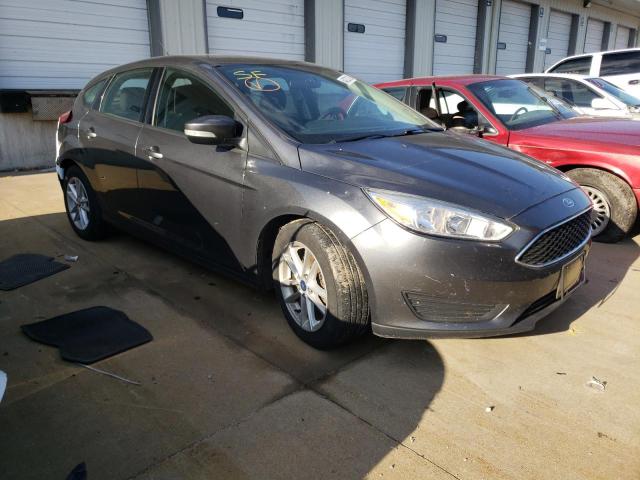 FORD FOCUS SE 2017 with VIN 1FADP3K27HL221088 - Photo from auction