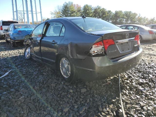 Photo 3 from auction – 2010 HONDA CIVIC HYBR with VIN JHMFA3F28AS005730