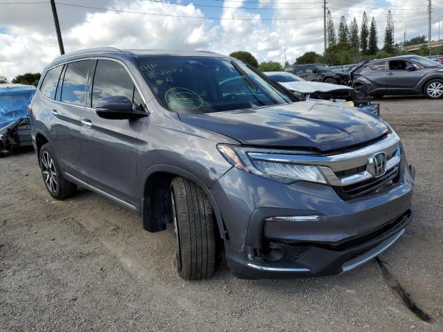 HONDA PILOT TOUR 2021 with VIN 5FNYF5H90MB016806 - Photo from auction