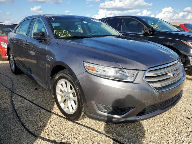 FORD TAURUS SE 2014 with VIN 1FAHP2D80EG143657 - Photo from auction