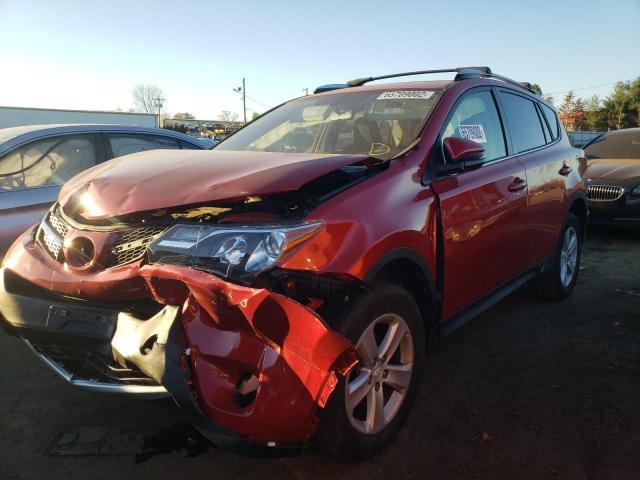 Photo 2 from auction – 2014 TOYOTA RAV4 XLE with VIN JTMRFREV5ED091734