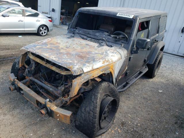 Photo 2 from auction – 2011 JEEP WRANGLER U with VIN 1J4BA6H11BL527031
