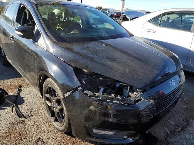 Photo 9 from auction – 2016 FORD FOCUS SE with VIN 1FADP3FE1GL328432