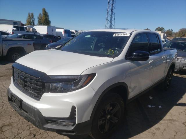 Photo 2 from auction – 2022 HONDA RIDGELINE with VIN 5FPYK3F8XNB007162