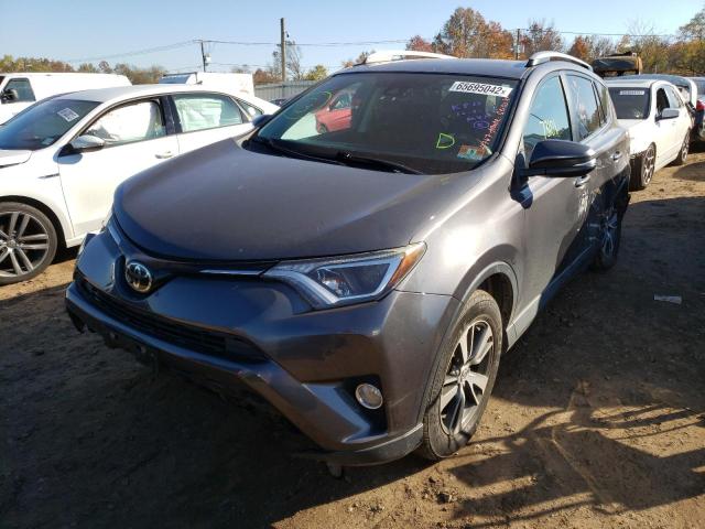 Photo 2 from auction – 2017 TOYOTA RAV4 XLE with VIN 2T3WFREV7HW401859